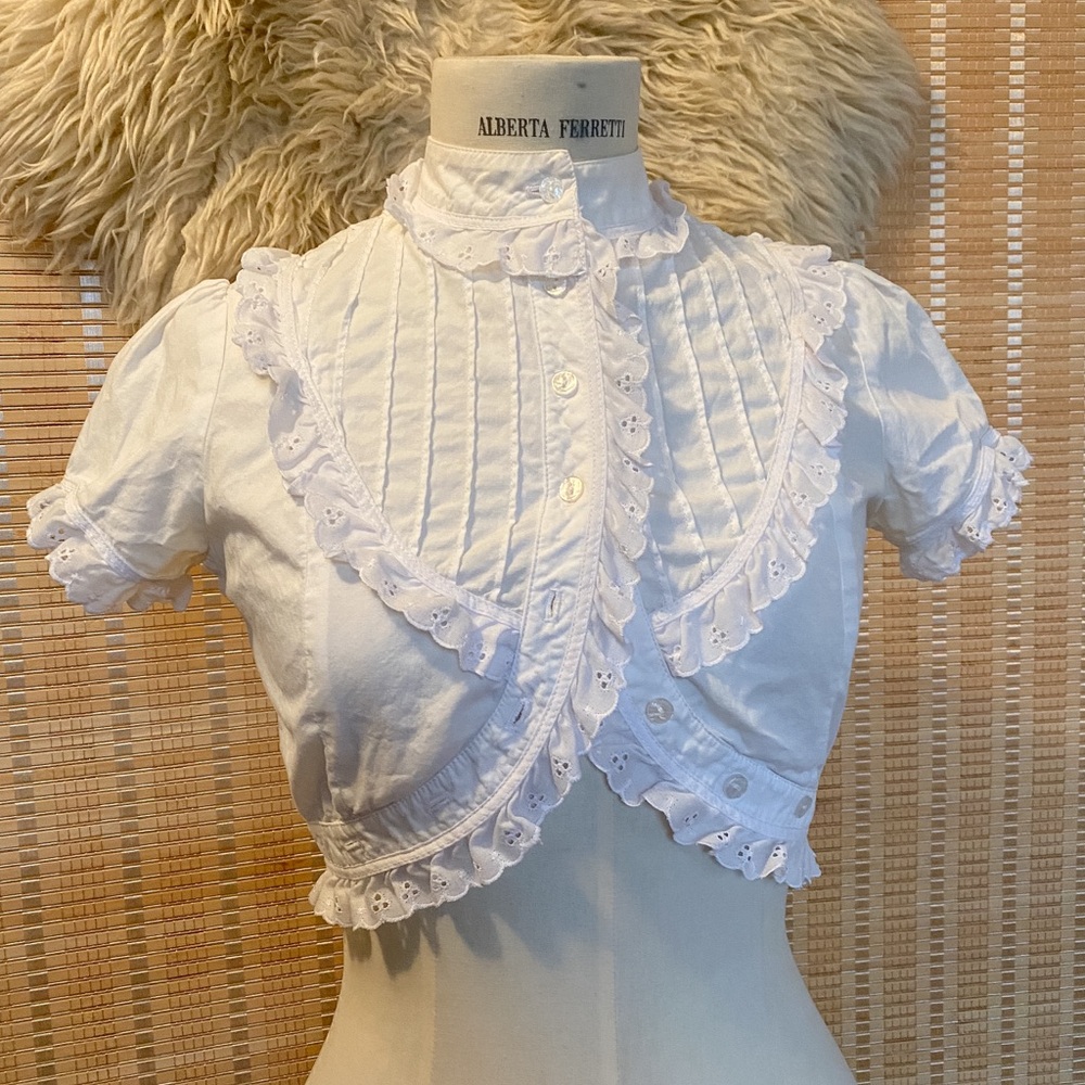 high neck ruffled blouse with accent crop